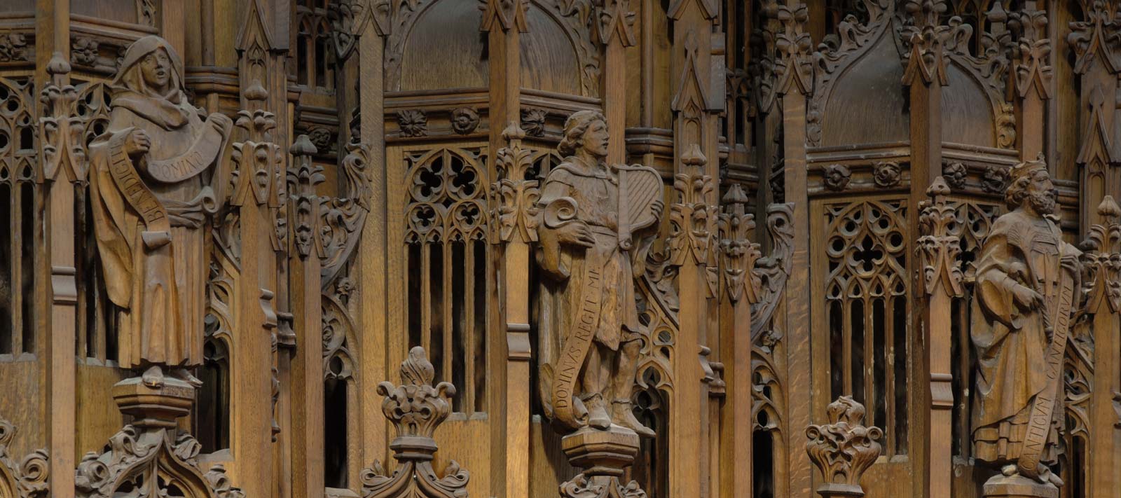 Carved figures on the wooden chapel screen